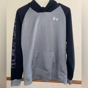 Under Amrour hoodie. Large but fits more like a medium.